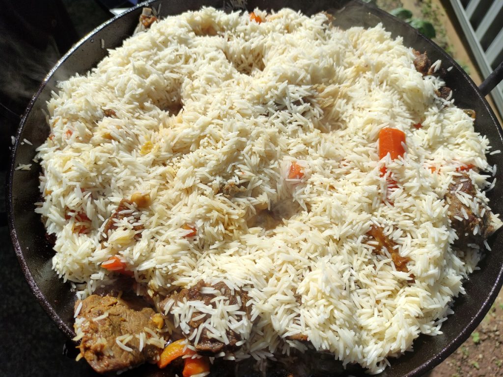 Uzbek Plov cooking rice